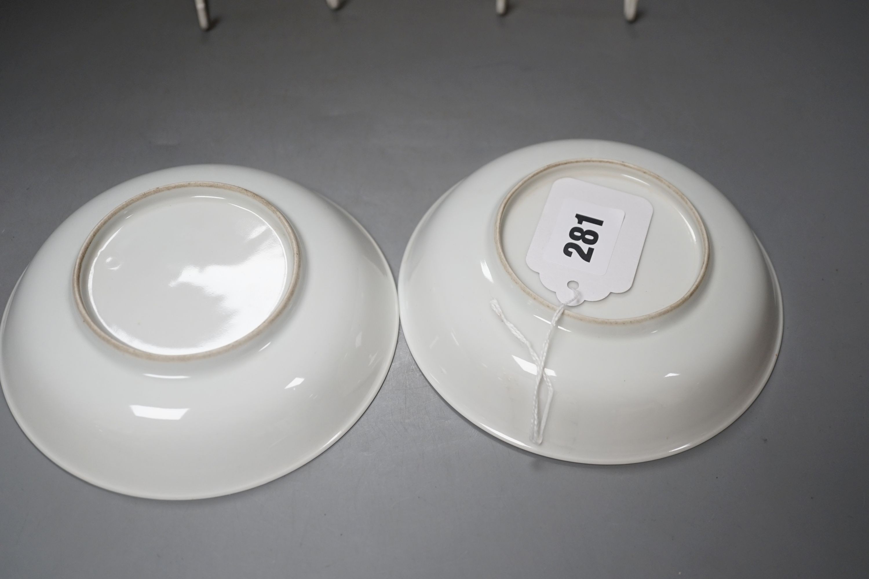 A pair of Chinese rouge de fer saucer dishes, 14 cm diameter